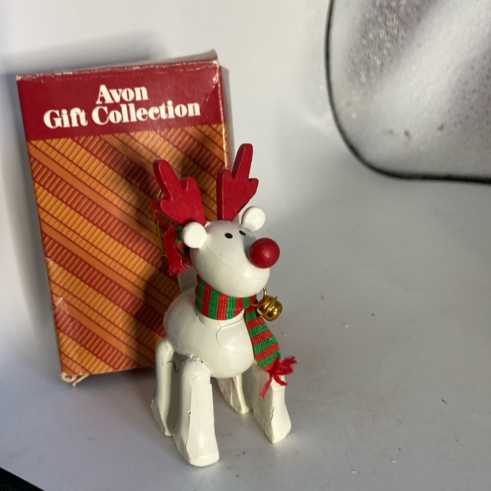 Avon Christmas reindeer ornament wood not glass white with red antlers